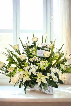 arrimo para condolencias de flores blancas a domicilio en Santiago